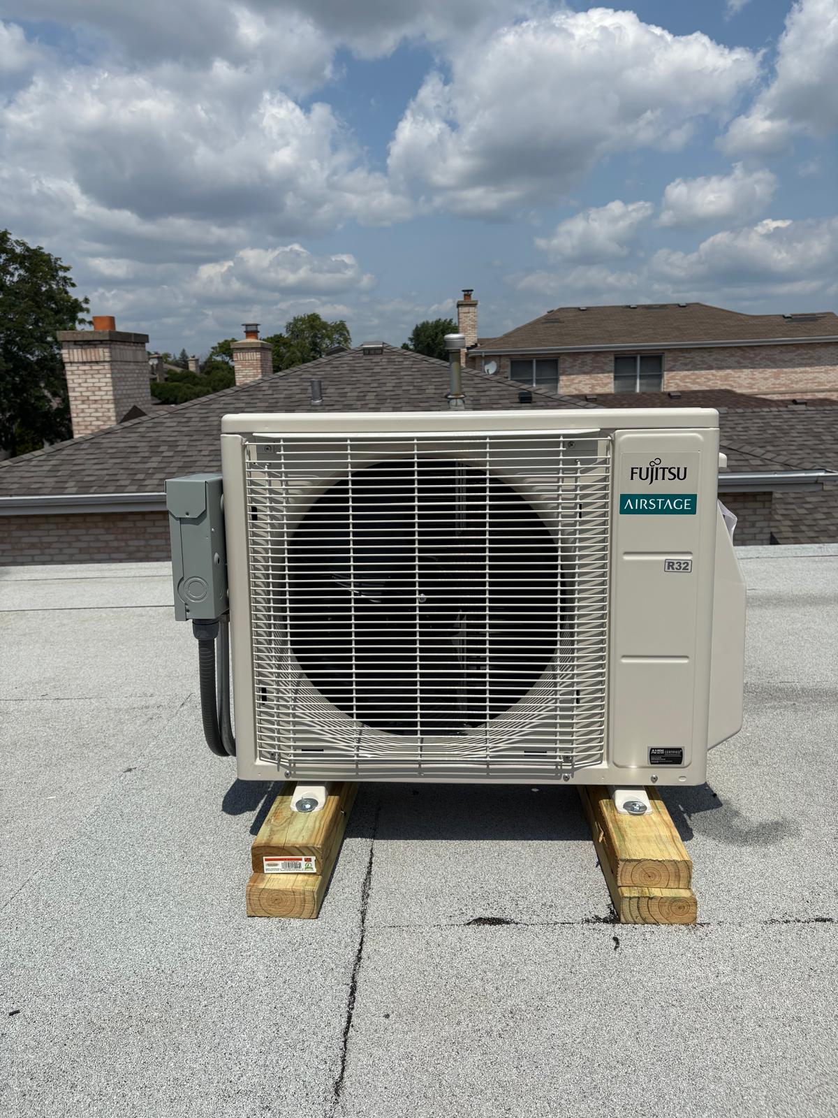Fujitsu outdoor condenser installed at Shawarma #1 in Harwood Heights, Illinois